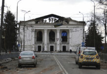 Russian Strikes Try To Disrupt Delivery of Western Weapons FILE - People walk past the Donetsk Academic Regional Drama Theatre in Mariupol, Ukraine, following a March 16, 2022, bombing of the theater, which was used as a shelter, in an area now controlled by Russian forces on Monday, April 4. Photo: Alexei Alexandrov / AP File