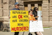 States Divided on Gun Controls, Even as Mass Shootings Rise People hold signs during a protest at the Capitol in Austin, Texas, on Wednesday May 25, 2022, after a mass shooting at an elementary school in Uvalde. Photo: Jay Janner / Austin American-Statesman via AP