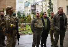 Ukraine, Russia Battle in the East as Zelenskyy Visits Front In this photo provided by the Ukrainian Presidential Press Office on Sunday, May 29, 2022, Ukrainian President Volodymyr Zelenskyy, centre, inspects damaged buildings, as he visits the war-hit Kharkiv region. Photo: Ukrainian Presidential Press Office via AP