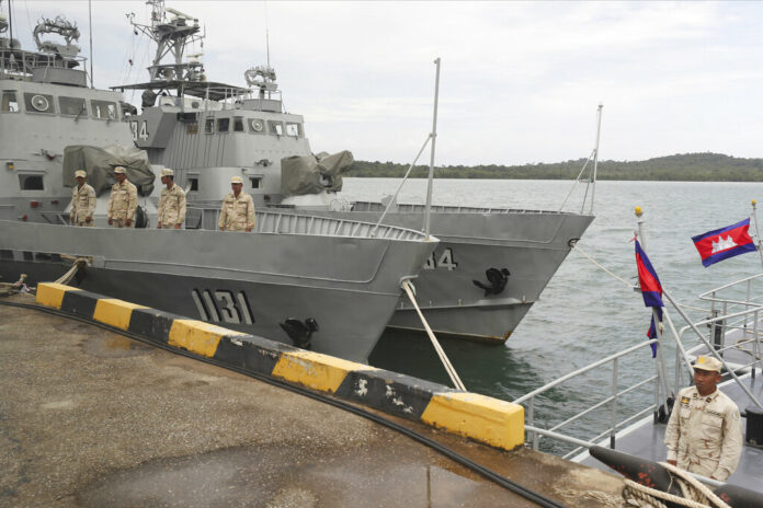 FILE - Cambodian navy crew stand on a patrol boat at the Ream Naval Base in Sihanoukville, southwest of Phnom Penh, Cambodia, July 26, 2019. Photo: Heng Sinith / AP File