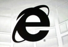 FILE - The Microsoft Internet Explorer logo is projected on a screen during a Microsoft Xbox E3 media briefing in Los Angeles, June 4, 2012. Photo: Damian Dovarganes / AP File