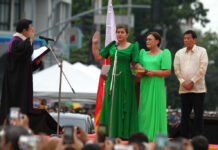 Duterte’s Daughter Takes Oath as Philippine Vice President Sara Duterte, the daughter of outgoing populist president of the Philippines, takes her oath as vice president during rites in her hometown in Davao city, southern Philippines, Sunday June 19, 2022. Photo: Manman Dejeto / AP