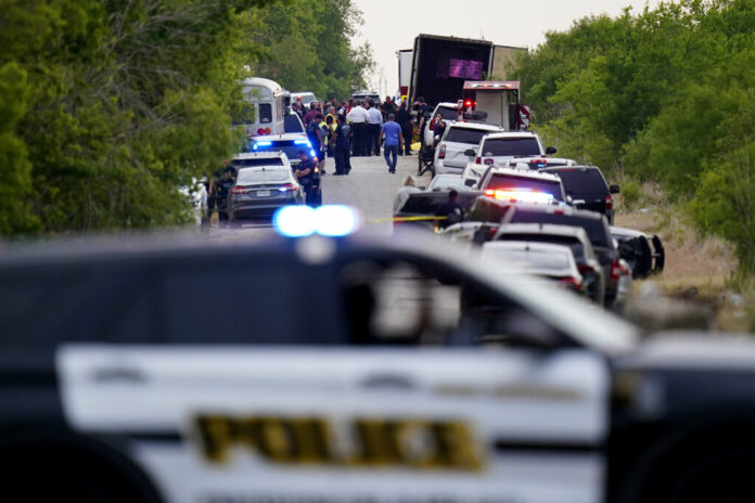 Police block the scene where a semitrailer with multiple dead bodies was discovered, Monday, June 27, 2022, in San Antonio. Photo: Eric Gay / AP
