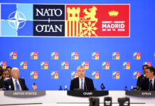 NATO Deems Russia Its ‘Most Significant and Direct Threat’ NATO Secretary General Jens Stoltenberg center, flanked by Spanish Prime Minister Pedro Sanchez, right, and U.S President Joe Biden open the first plenary session of the NATO summit in Madrid, Wednesday, June 29, 2022. Photo: Bertrand Guay / Pool via AP