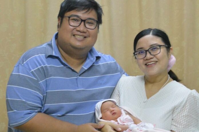 A photo of Roengchai Yenkhuntos, 34, a sales supervisor at IKEA Thailand, his wife, and his baby taken when he took a fully paid paternity leave two years ago. Photo: Roengchai Yenkhuntos / Courtesy.