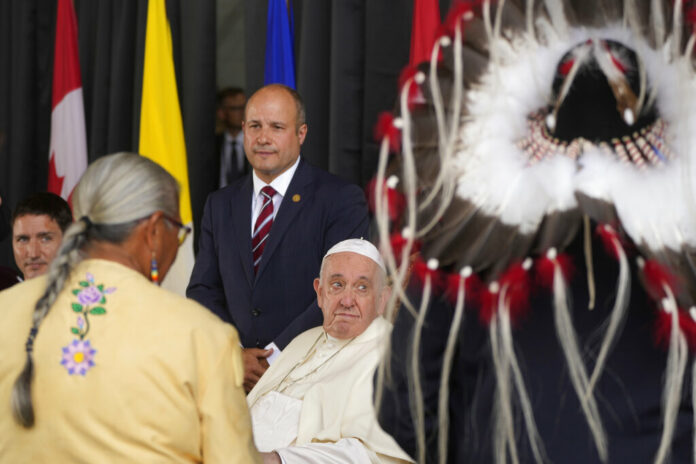 Pope Francis meets the Canadian Indigenous people as he arrives at Edmonton's International airport, Canada, Sunday, July 24, 2022. Photo: Gregorio Borgia / AP Pope Francis meets the Canadian Indigenous people as he arrives at Edmonton's International airport, Canada, Sunday, July 24, 2022. Photo: Gregorio Borgia / AP