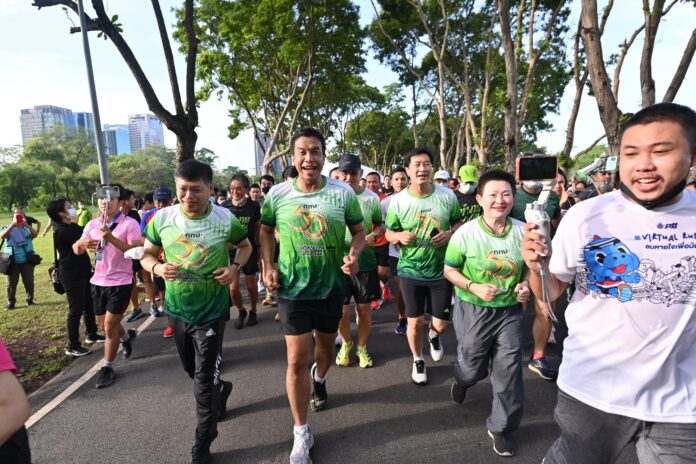 Bangkok Governor Chadchart Sittipunt is livestreamed as jogs through Wachirabenchathat Park (Rod Fai Park) on July 3, 2022.