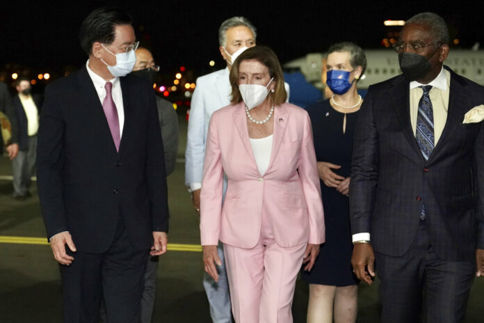 In this photo released by the Taiwan Ministry of Foreign Affairs, U.S. House Speaker Nancy Pelosi, center, arrives in Taipei, Taiwan, Tuesday, Aug. 2, 2022. Photo: Taiwan Ministry of Foreign Affairs via AP In this photo released by the Taiwan Ministry of Foreign Affairs, U.S. House Speaker Nancy Pelosi, center, arrives in Taipei, Taiwan, Tuesday, Aug. 2, 2022. Photo: Taiwan Ministry of Foreign Affairs via AP