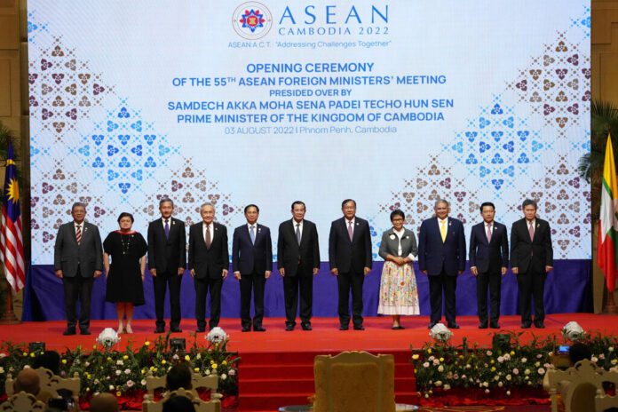 From left to right; Malaysian Foreign Minister Saifuddin Abdullah, Philippines Foreign Affairs acting Undersecretary Theresa Lazaro, Singapore Foreign Minister Vivian Balakrishnan, Thailand's Foreign Minister Don Pramudwinai, Vietnam Foreign Minister But Thanh Son, Cambodia's Prime Minister Hun Sen, Cambodia's Foreign Minister Peak Sokhonn, Indonesia's Foreign Minister Retno Marsudi, Brunei Second Minister of Foreign Affair Erywan Yusof, Laos Foreign Minister Saleumxay Kommasith, and Secretary-General of ASEAN Lim Jock Hoi poses for a group photograph during the opening for the 55th ASEAN Foreign Ministers' Meeting (55th AMM) in Phnom Penh, Cambodia, Wednesday, Aug. 3, 2022. Photo: Heng Sinith / AP