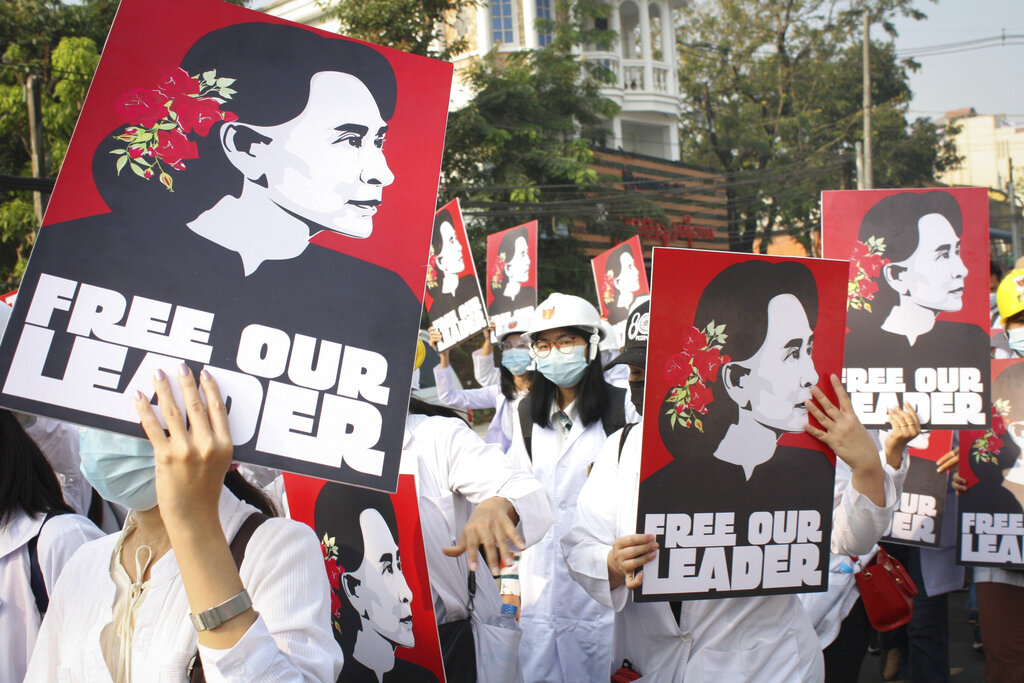 FILE - Medicals students display images of deposed Myanmar leader Aung San Suu Kyi during a street march in Yangon, Myanmar, on Feb. 28, 2021. A Myanmar court convicted Suu Kyi in more corruption cases Monday, Aug. 15, 2022, adding six years to prison sentence. Photo: AP File