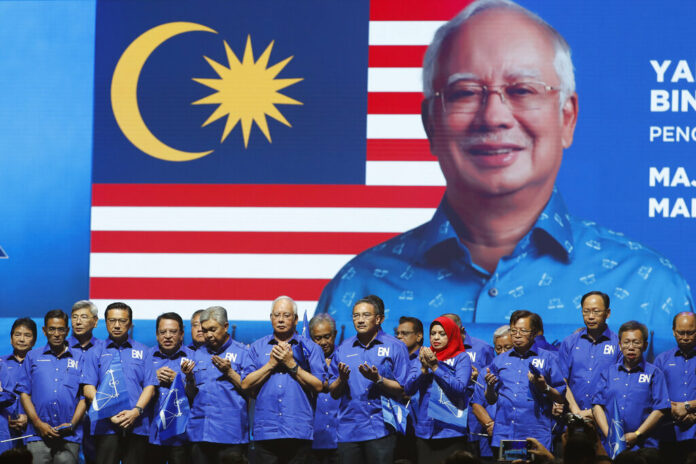 FILE - In this April 7, 2018, file photo, then Malaysia's Prime Minister and President of the ruling party coalition FILE - In this April 7, 2018, file photo, then Malaysia's Prime Minister and President of the ruling party coalition