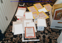Feds Cite Efforts To Obstruct Probe of Docs at Trump Estate This image contained in a court filing by the Department of Justice on Aug. 30, 2022, and redacted by in part by the FBI, shows a photo of documents seized during the Aug. 8 search by the FBI of former President Donald Trump's Mar-a-Lago estate in Florida. Photo: U.S. Department of Justice via AP