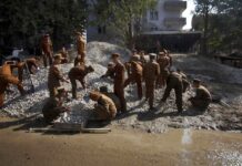 N. Korea May Send Workers To Russian-occupied East Ukraine FILE - North Korean construction workers labor in the Mansudae area of Pyongyang, North Korea, Oct. 11, 2011. Photo: David Guttenfelder / AP File