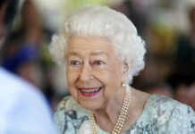 Queen Elizabeth II, Britain’s Monarch for 70 Years, Dies FILE - Britain's Queen Elizabeth II looks on during a visit to officially open the new building at Thames Hospice, Maidenhead, England July 15, 2022. Photo: Kirsty O'Connor / Pool Photo via AP File