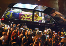 Arrests of UK Anti-royal Protesters Spur Free-speech Debate The coffin of Queen Elizabeth II in the royal hearse travels to Buckingham Palace in London, Tuesday Sept. 13, 2022. Photo: Marco Bertorello / Pool via AP