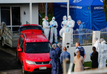 Woman Arrested in S. Korea After Bodies Found in New Zealand FILE - New Zealand police investigators work at a scene in Auckland on Aug. 11, 2022, after bodies were discovered in suitcases. Photo: Dean Purcell / New Zealand Herald via AP File