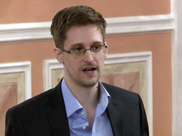 FILE - In this image made from video and released by WikiLeaks, former National Security Agency systems analyst Edward Snowden speaks in Moscow, Oct. 11, 2013. Photo: AP File