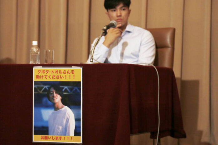 FILE - An image of Toru Kubota, a Japanese journalist detained in Myanmar while covering a protest, is displayed at the Japan Press Club in Tokyo on Aug. 3, 2022 as his friends gathered at the club calling for his immediate release. Photo: Yuri Kageyama / AP File