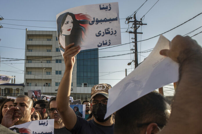 FILE - Protesters gather in Sulaimaniyah on Sept. 28, 2022, protest the killing of Mahsa Amini, an Iranian Kurdish woman after she was arrested in Tehran by morality police for wearing her headscarf improperly. Photo: Hawre Khalid / Metrography / AP File