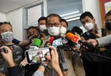 CNN Apologizes for Entering Thai Massacre Site, Pulls Video Chief executive of Uthai Sawan Sub-district Administrative Organization Danaichok Boonsom, talks to reporters at a police station in Uthai Sawan, north eastern Thailand, Sunday, Oct. 9, 2022. Photo: Sakchai Lalit / AP