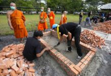 Cremations Readied for Nong Bua Lamphu Massacre Victims Buddhist monks oversee the making of cremation furnaces at Wat Rat Samakee temple in Uthai Sawan, northeastern Thailand, Monday, Oct. 10, 2022. Photo: Sakchai Lalit / AP