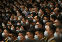 China Party Says Nearly 5 Million Members Probed for Graft FILE - Delegates wearing masks attend the opening ceremony of the 20th National Congress of China's ruling Communist Party held at the Great Hall of the People in Beijing, China, Sunday, Oct. 16, 2022. Photo: Mark Schiefelbein / AP File
