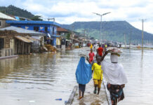 Nigeria Races to Assist Flood Victims; Death Toll Tops 600 FILE- A view of stranded people due to floods following several days of downpours in Kogi Nigeria, Thursday, Oct. 6, 2022. Photo: Fatai Campbell / AP File