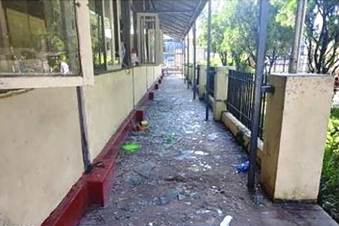 In this photo provided by the Military True News Information Team, a parcel-reception location at the entrance of the Insein prison sits damaged after an explosion Wednesday, Oct. 19, 2022, in Yangon, Myanmar. Photo: Military True News Information Team via AP