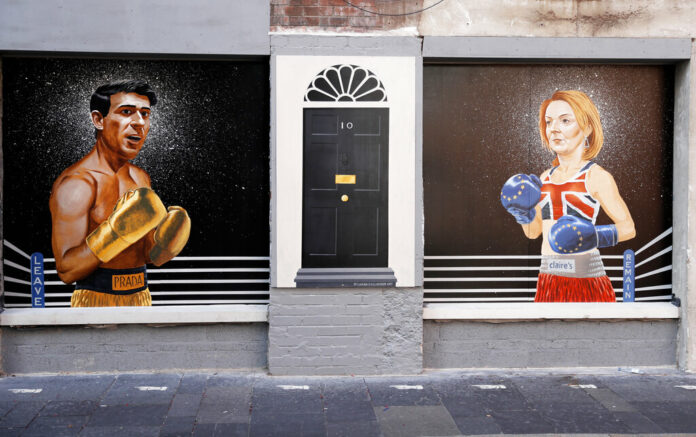 FILE - A new mural showing the two Conservative leadership contestants Rishi Sunak and Liz Truss appears on a wall in Belfast City Centre, Northern Ireland, Tuesday, Aug. 16, 2022. Photo: Peter Morrison / AP File FILE - A new mural showing the two Conservative leadership contestants Rishi Sunak and Liz Truss appears on a wall in Belfast City Centre, Northern Ireland, Tuesday, Aug. 16, 2022. Photo: Peter Morrison / AP File