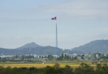 North Korea Threatens To Use Nuke Over S. Korea-US Drills FILE - A North Korean flag flutters in the wind near the border villages of Panmunjom in Paju, South Korea on Oct. 4, 2022. Photo: Ahn Young-joon / AP File