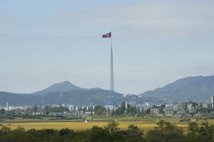 FILE - A North Korean flag flutters in the wind near the border villages of Panmunjom in Paju, South Korea on Oct. 4, 2022. Photo: Ahn Young-joon / AP File