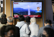 North Korea Keeps Up Its Missile Barrage With Launch of ICBM A TV screen showing a news program reporting about North Korea's missile launch with file footage is seen at the Seoul Railway Station in Seoul, South Korea, Thursday, Nov. 3, 2022. Photo: Lee Jin-man / AP