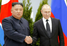 N. Korea Denies US Claims It Sent Artillery Shells to Russia FILE - Russian President Vladimir Putin, right, and North Korea's leader Kim Jong Un shake hands during their meeting in Vladivostok, Russia on April 25, 2019. Photo: Alexander Zemlianichenko / Pool / AP File