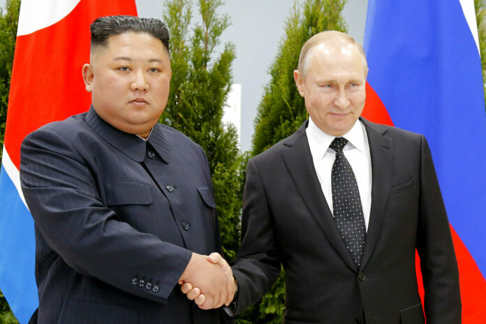 FILE - Russian President Vladimir Putin, right, and North Korea's leader Kim Jong Un shake hands during their meeting in Vladivostok, Russia on April 25, 2019. Photo: Alexander Zemlianichenko / Pool / AP File FILE - Russian President Vladimir Putin, right, and North Korea's leader Kim Jong Un shake hands during their meeting in Vladivostok, Russia on April 25, 2019. Photo: Alexander Zemlianichenko / Pool / AP File