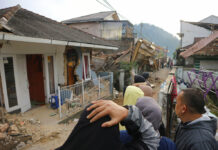162 Dead as Indonesia Quake Topples Homes, Buildings, Roads Residents react as they inspect houses damaged by Monday's earthquake in Cianjur, West Java, Indonesia Tuesday, Nov. 22, 2022. Photo: Rangga Firmansyah / AP