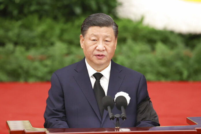 In this photo released by Xinhua News Agency, Chinese President Xi Jinping speaks during a memorial for the late former Chinese President Jiang Zemin, who passed away on Nov. 30 at the age of 96, held in the Great Hall of the People in Beijing on Tuesday, Dec. 6, 2022. Photo: Pang Xinglei / Xinhua via AP