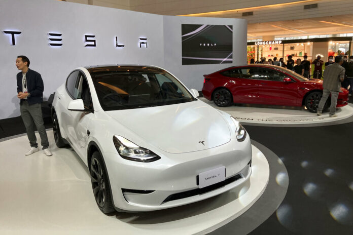 Tesla electric vehicles are displayed during a public launching event Wednesday, Dec. 7, 2022, in Bangkok, Thailand. Photo: Tassanee Vejpongsa / AP