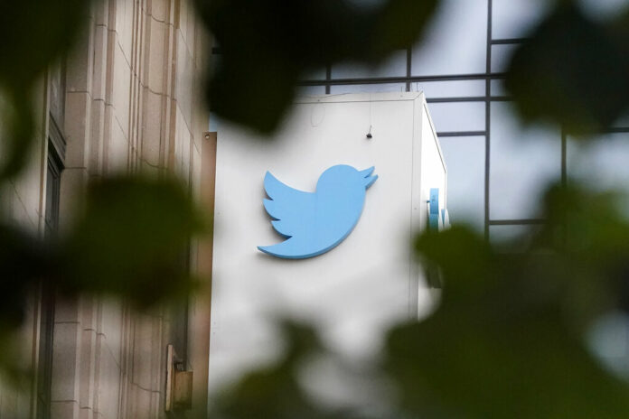 FILE - A sign at Twitter headquarters is shown in San Francisco, Thursday, Dec. 8, 2022. Photo: Jeff Chiu / AP File