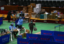 2 COVID-19 Deaths Reported in Beijing as Virus Surges Medical workers tend to residents at a gymnasium converted into a fever clinic in Beijing, Sunday, Dec. 18, 2022. Photo: Andy Wong / AP