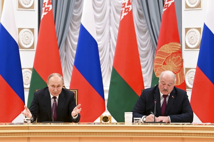 Russian President Vladimir Putin and Belarusian President Alexander Lukashenko attend the talks in Minsk, Belarus, Monday, Dec. 19, 2022. Photo: Pavel Bednyakov, Sputnik / Kremlin Pool Photo via AP