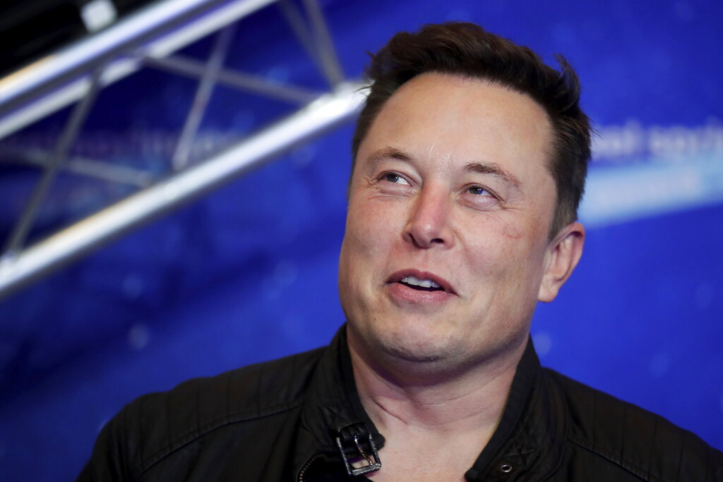 FILE - Tesla and SpaceX CEO Elon Musk arrives on the red carpet for the Axel Springer media award in Berlin on Dec. 1, 2020. Photo: Hannibal Hanschke / Pool Photo via AP File