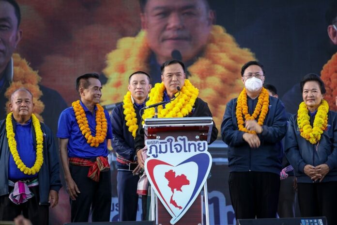 Bhumjaithai Party leader Anutin Charnvirakul speaks to his supporters in Nakhon Phanom province on Dec. 4, 2022.
