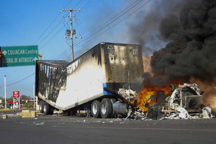 A truck burns on a street in Culiacan, Sinaloa state, Thursday, Jan. 5, 2023. Photo: Martin Urista / AP A truck burns on a street in Culiacan, Sinaloa state, Thursday, Jan. 5, 2023. Photo: Martin Urista / AP