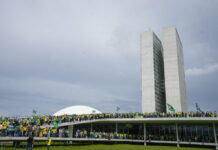 Pro-Bolsonaro Rioters Storm Brazil’s Top Government Offices Protesters, supporters of Brazil's former President Jair Bolsonaro, storm the the National Congress building in Brasilia, Brazil, Sunday, Jan. 8, 2023. Photo: Eraldo Peres / AP