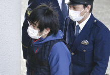 Suspect Charged With Murder in Assassination of Japan’s Abe Tetsuya Yamagami, the alleged assassin of Japan's former Prime Minister Shinzo Abe, enters a police station in Nara, western Japan, on Jan. 10, 2023. Photo: Kyodo News via AP