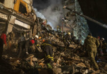 Ukraine Building Suffers Deadliest Civilian Attack in Months Emergency workers clear the rubble after a Russian rocket hit a multistory building leaving many people under debris in the southeastern city of Dnipro, Ukraine, Saturday, Jan. 14, 2023. Photo: Evgeniy Maloletka / AP