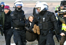 Greta Thunberg Carried Away by Police at German Mine Protest Police officers carry Swedish climate activist Greta Thunberg away from the edge of the Garzweiler II opencast lignite mine during a protest action by climate activists after the clearance of Luetzerath, Germany, Tuesday, Jan. 17, 2023. Photo: Federico Gambarini / dpa via AP