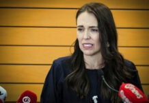 New Zealand’s Ardern To Leave Office, Sets October Election New Zealand Prime Minister Jacinda Ardern grimaces as she announces her resignation at a press conference in Napier, New Zealand. Fighting back tears, Ardern told reporters that Feb. 7 will be her last day in office. Photo: Warren Buckland / New Zealand Herald via AP