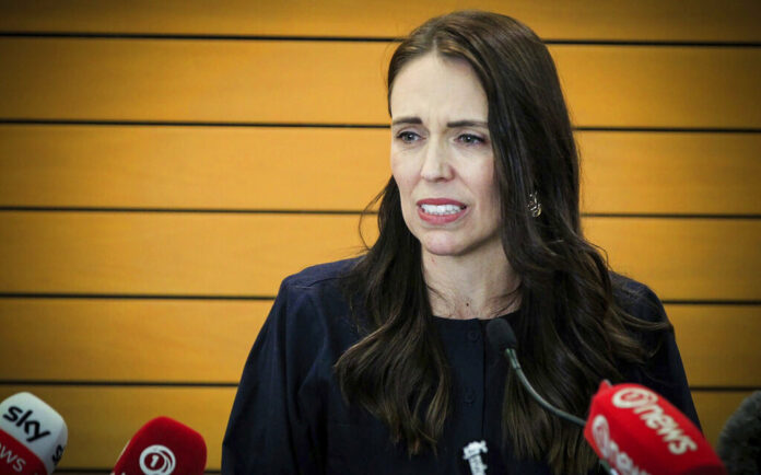 New Zealand Prime Minister Jacinda Ardern grimaces as she announces her resignation at a press conference in Napier, New Zealand. Fighting back tears, Ardern told reporters that Feb. 7 will be her last day in office. Photo: Warren Buckland / New Zealand Herald via AP