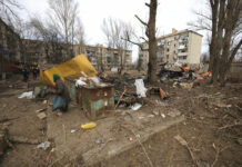‘Fast-track’ Talks Underway for Missiles, Planes to Ukraine A local woman walks in the yard of a residential neighbourhood after a Russian attack in Kostiantynivka, Ukraine, Saturday, Jan. 28, 2023. Photo: Andriy Dubchak / AP